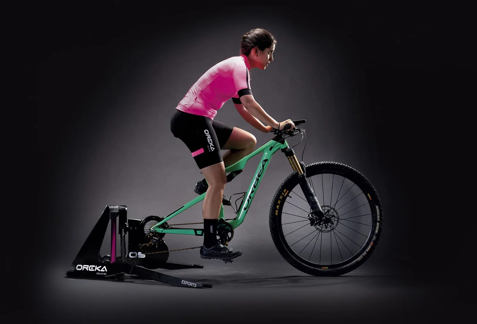 Cyclist riding an OREKA indoor trainer